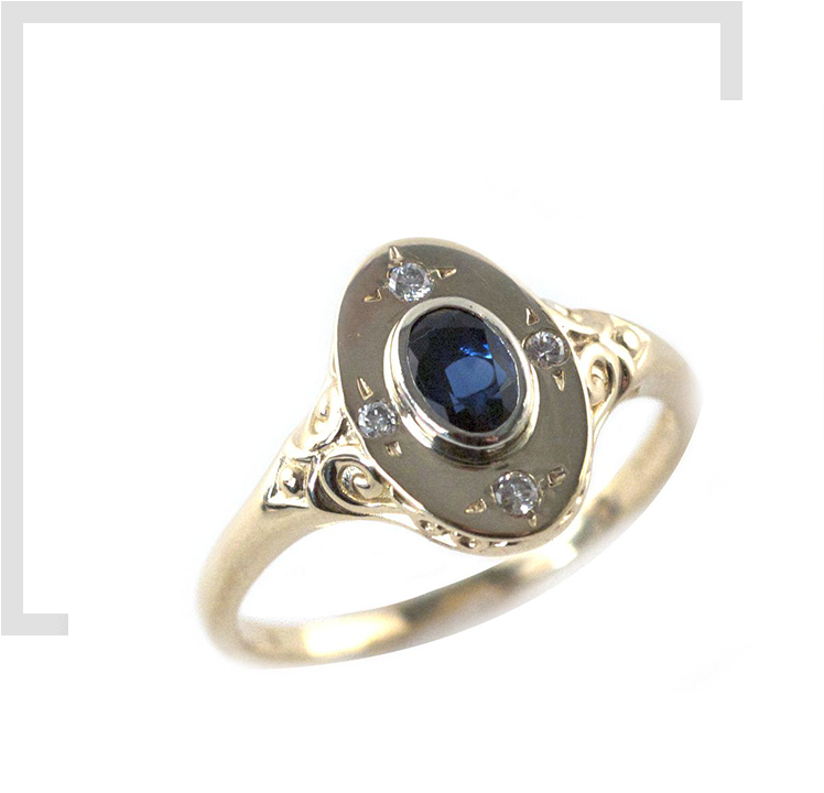 A gold ring with a blue stone on it